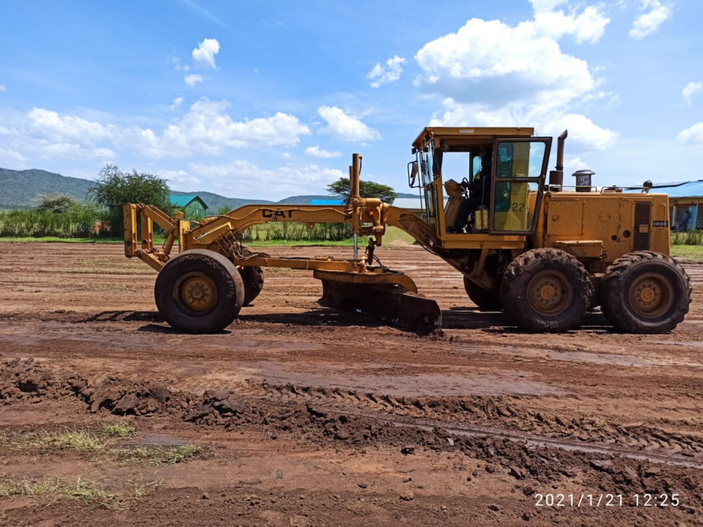 Images from the construction of a football pitch at Ilkimatare Primary ...